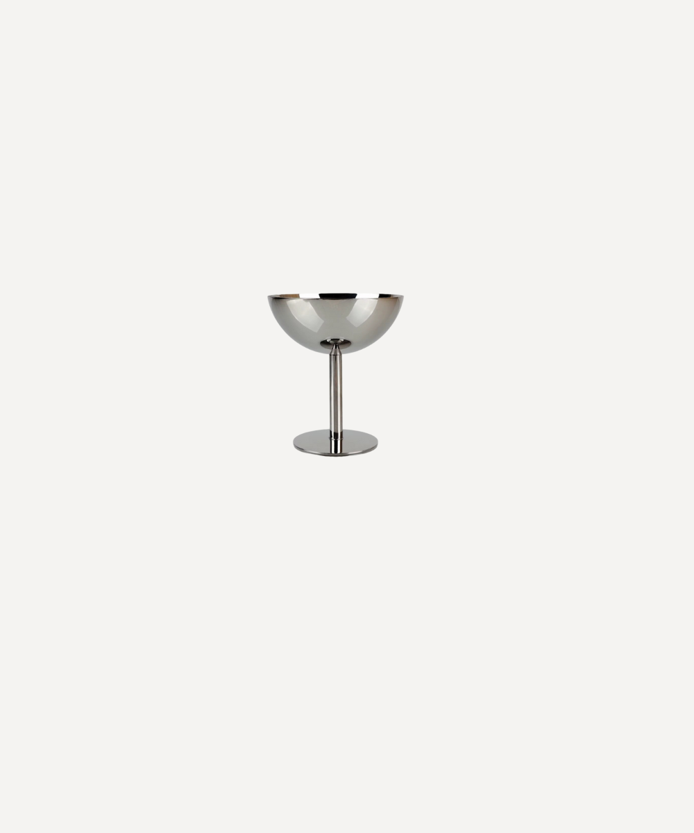 Metallic cocktail glass on a white background