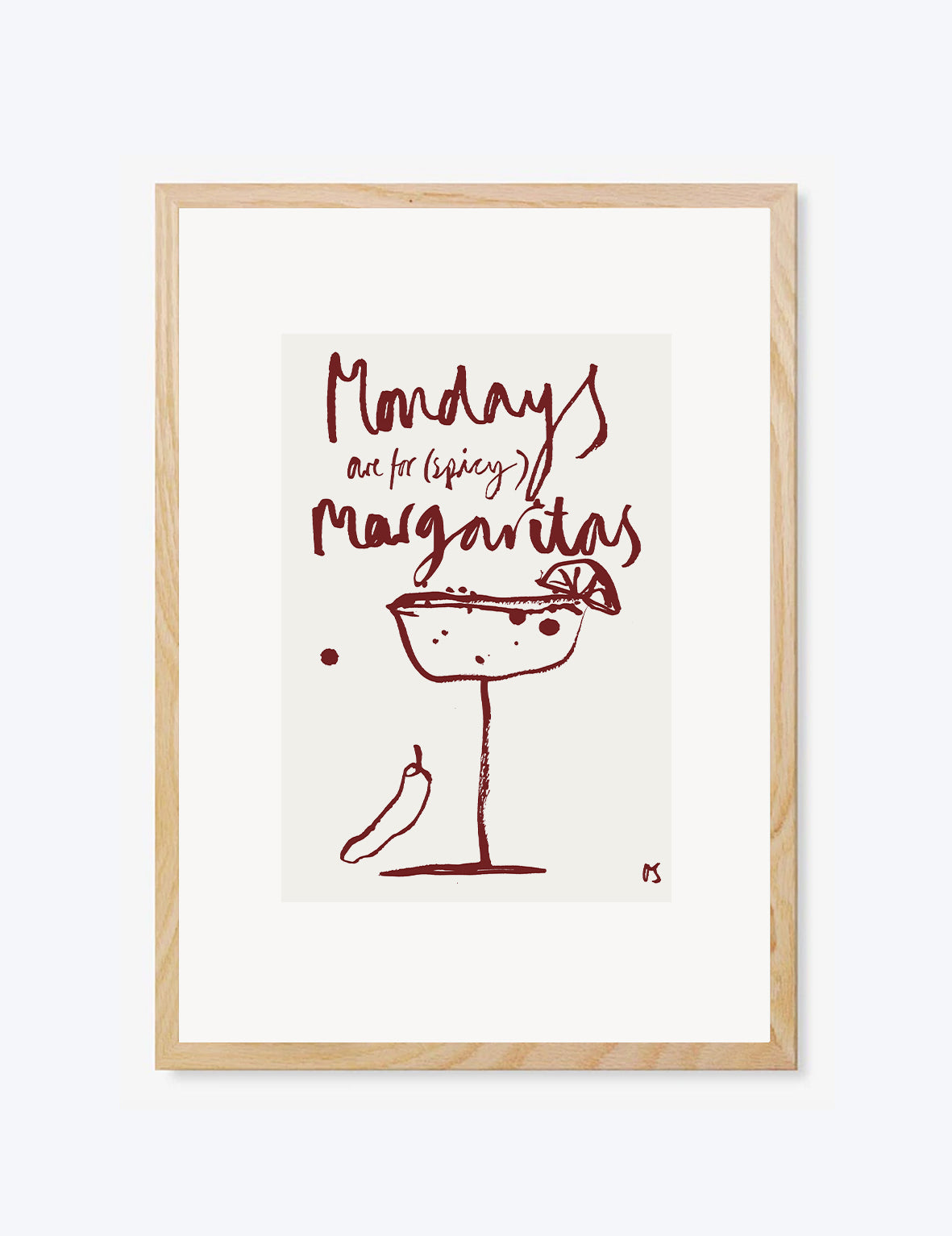 Framed artwork with a red cocktail graphic and text on a white background