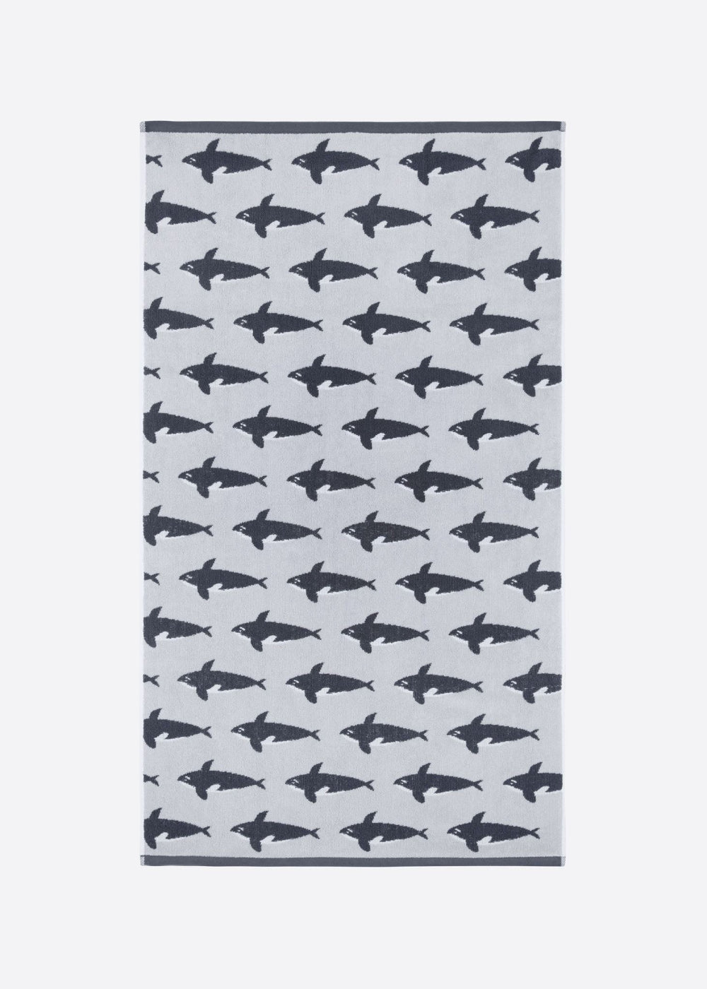 Towel with Orca Whale pattern on a light blue background