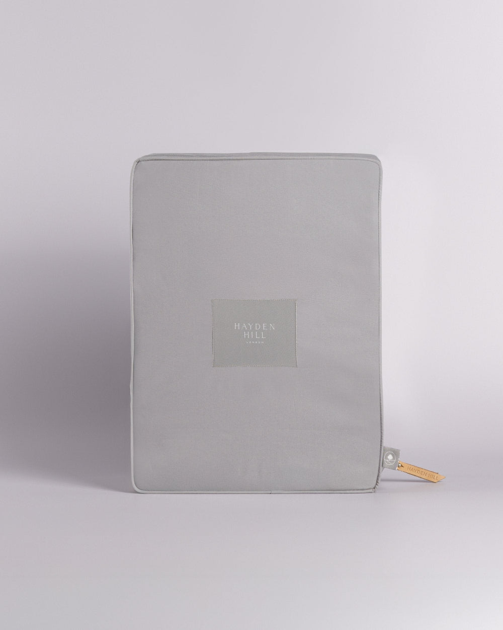 Grey Storage bag with Hayden Hill London branding on a light grey background