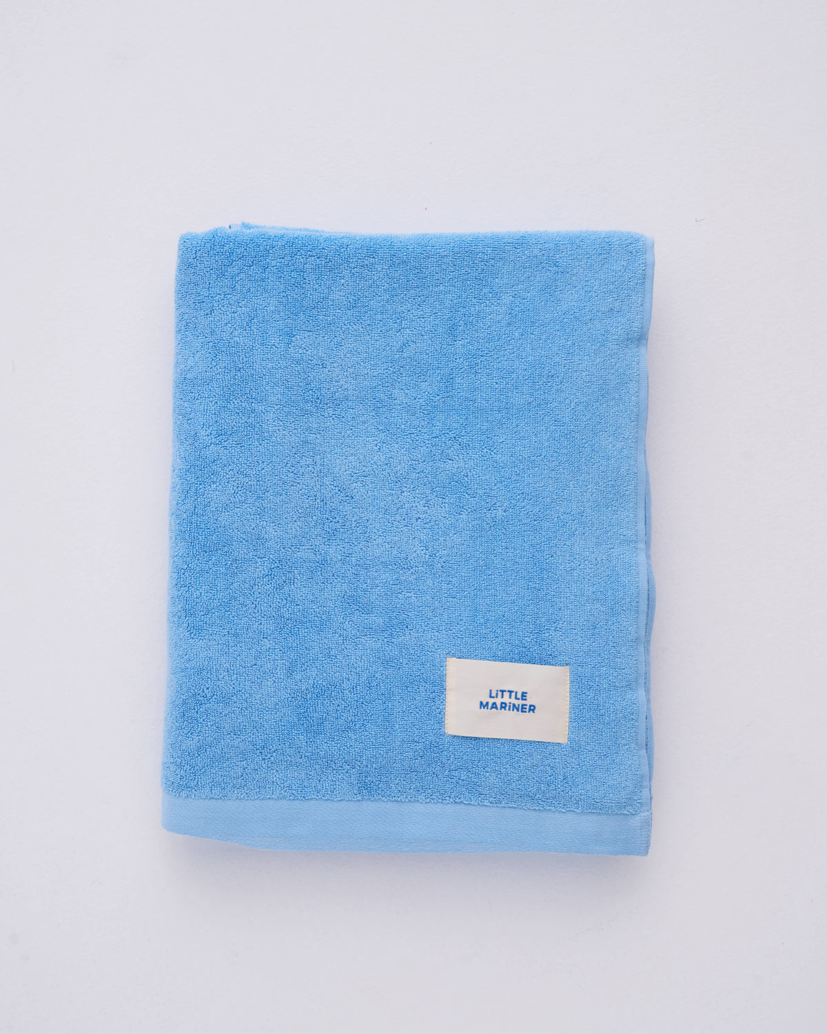 Coastal blue organic cotton beach towel by Little Mariner