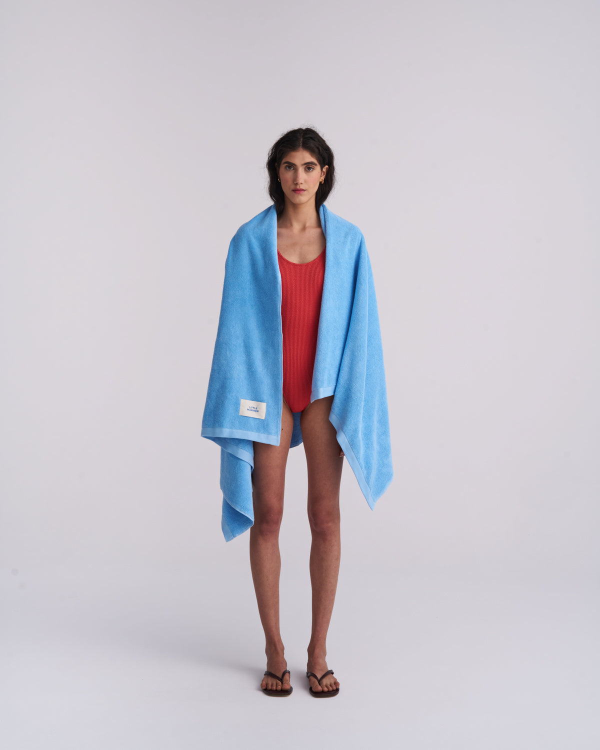Luxury blue terry beach towel made from organic cotton