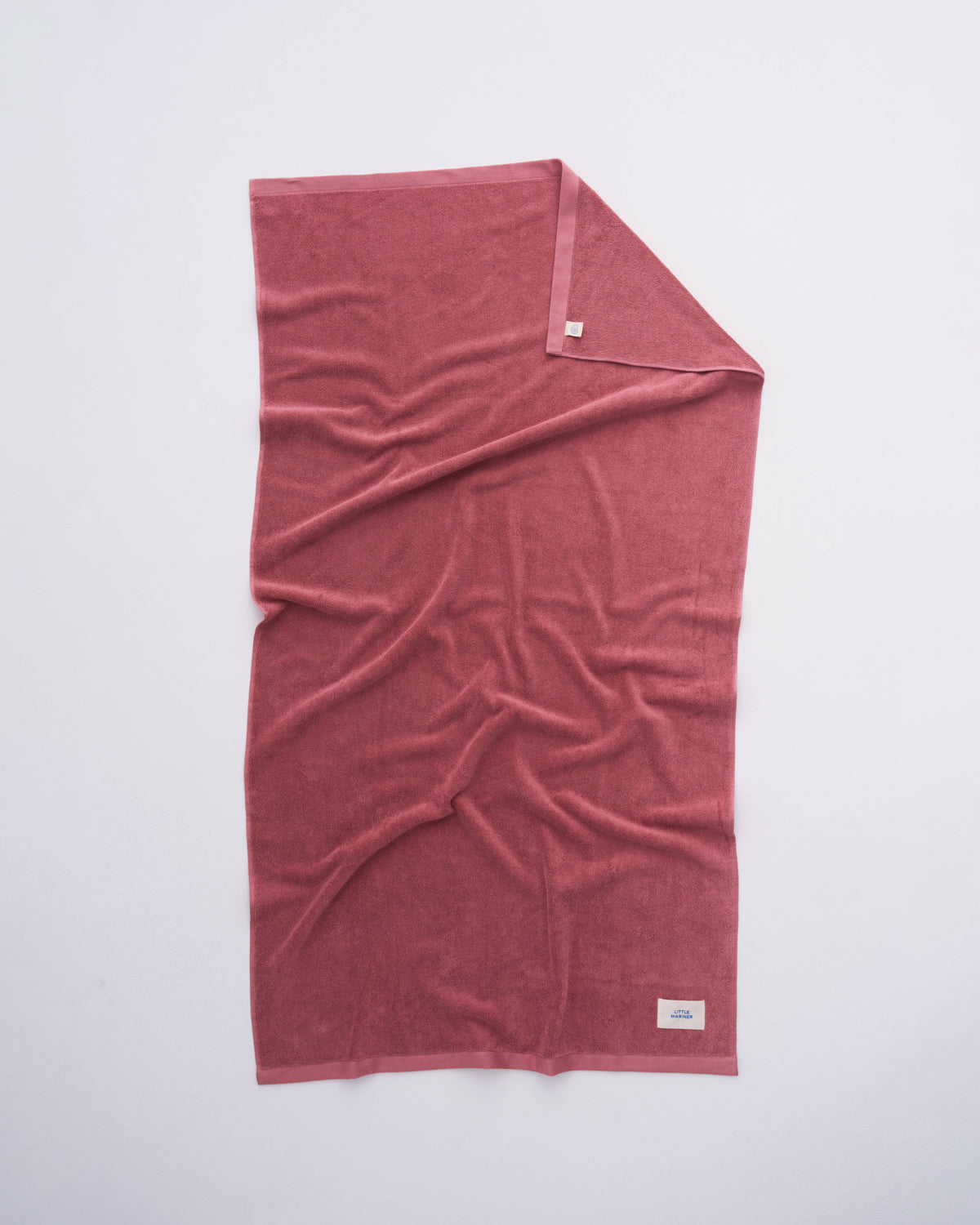Soft dusty rose beach towel for poolside and summer holidays