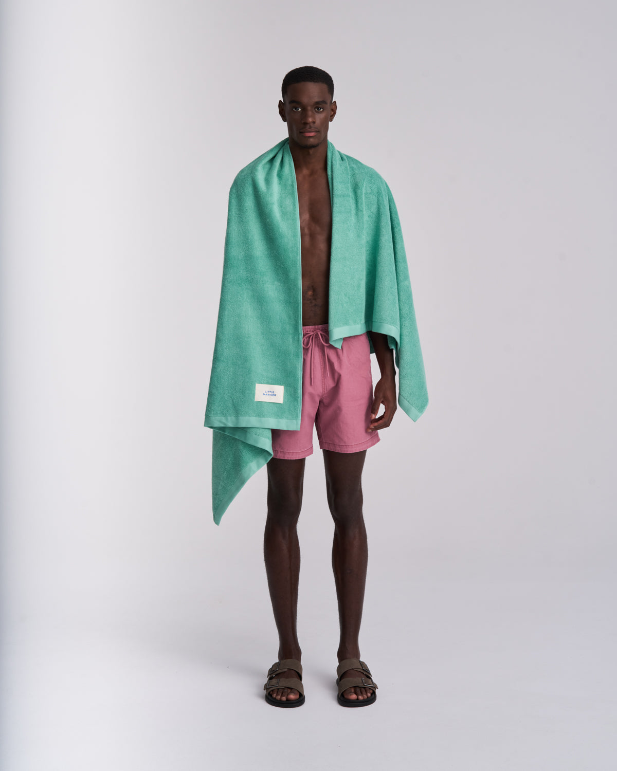 Luxury sage green terry beach towel made from organic cotton