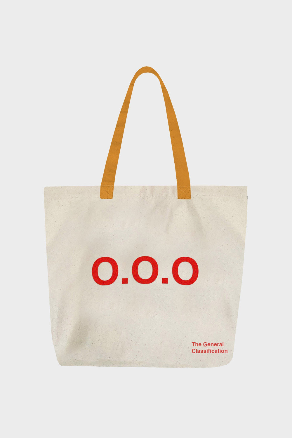 A cream canvas tote bag with mustard yellow shoulder straps, featuring the red text 'O.O.O'