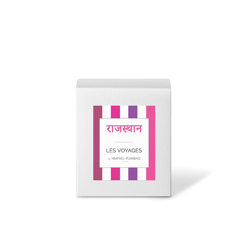 White box with pink and purple striped design and text on a white background
