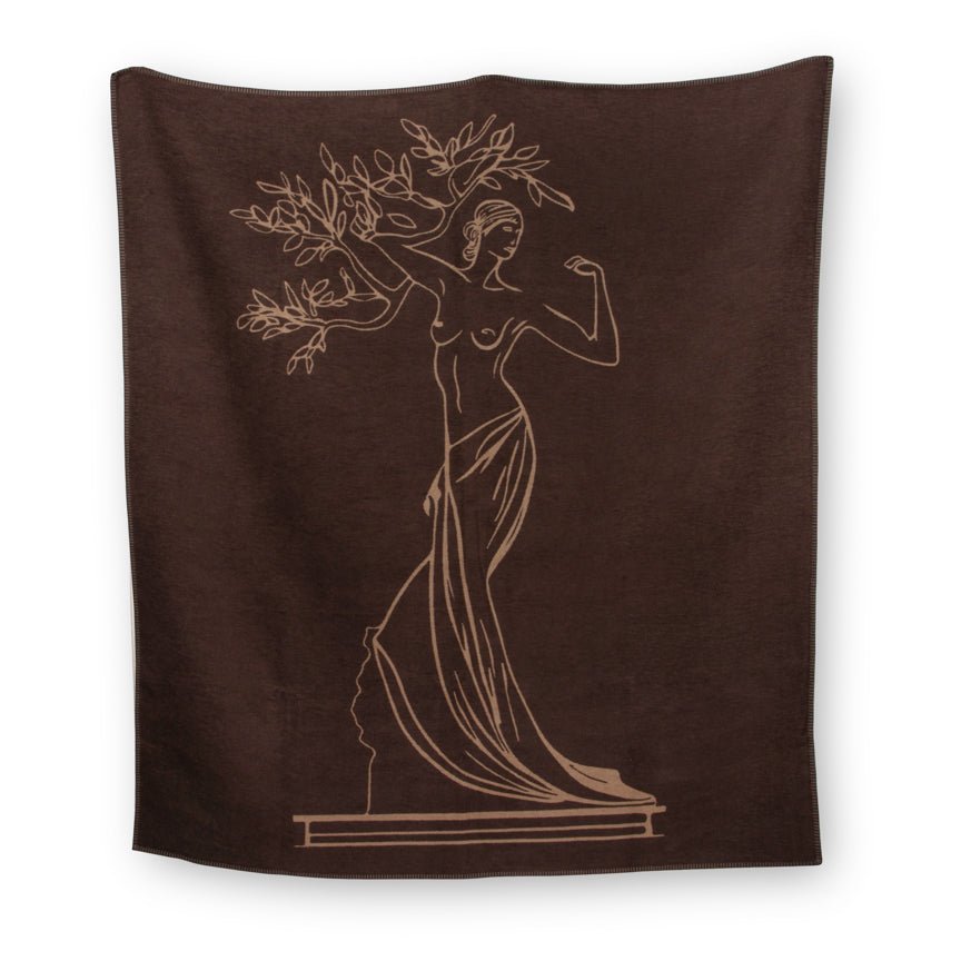 Brown blanket with beige silhouette design of a woman holding an olive branch on a white background