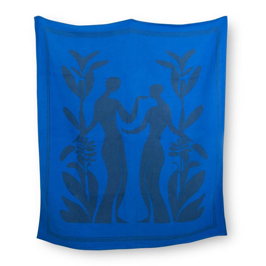 Blue blanket with black silhouette of two people and plants on a white background