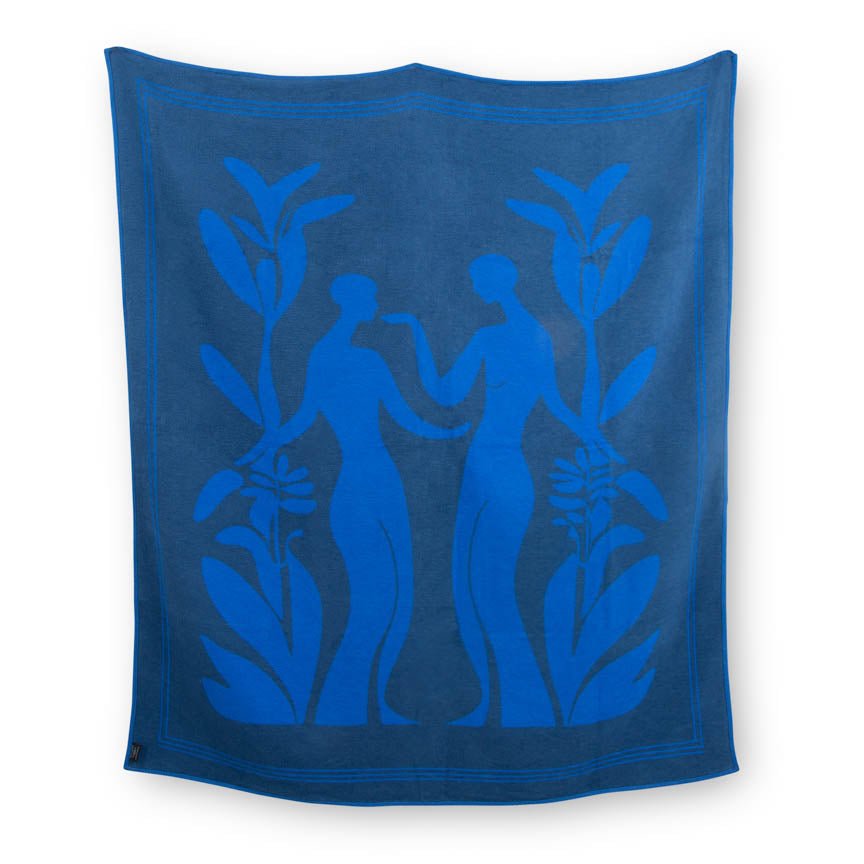 Blue blanket with silhouettes of two people and leaves on a white background