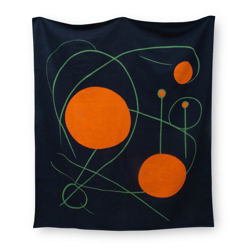 Black Blanket with orange circles and green lines on a white background