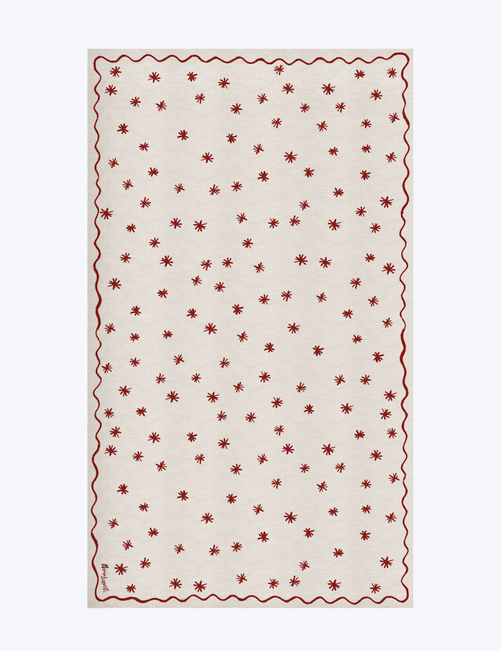 Rectangular linen tablecloth with red star pattern on a white background