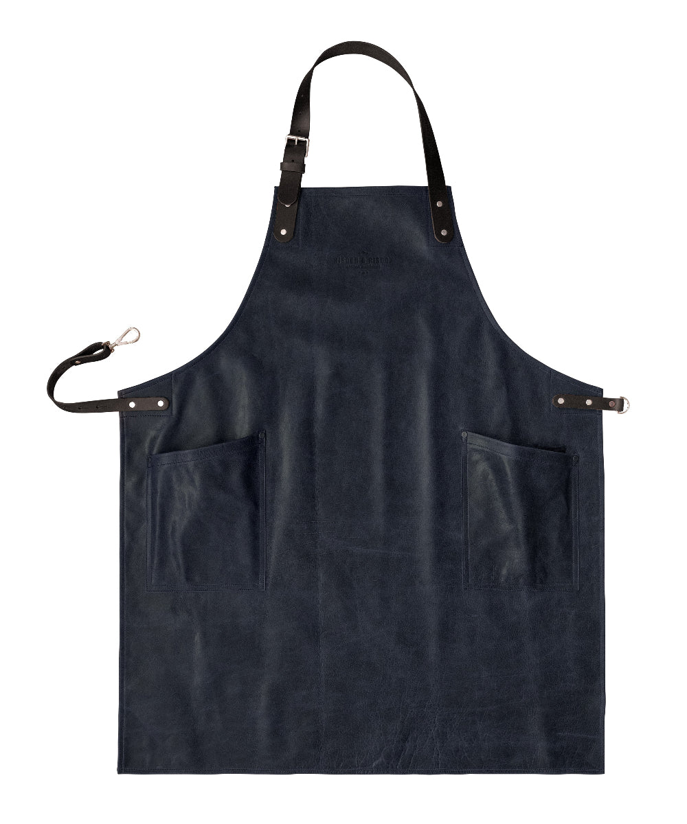 Black apron with leather straps on a white background