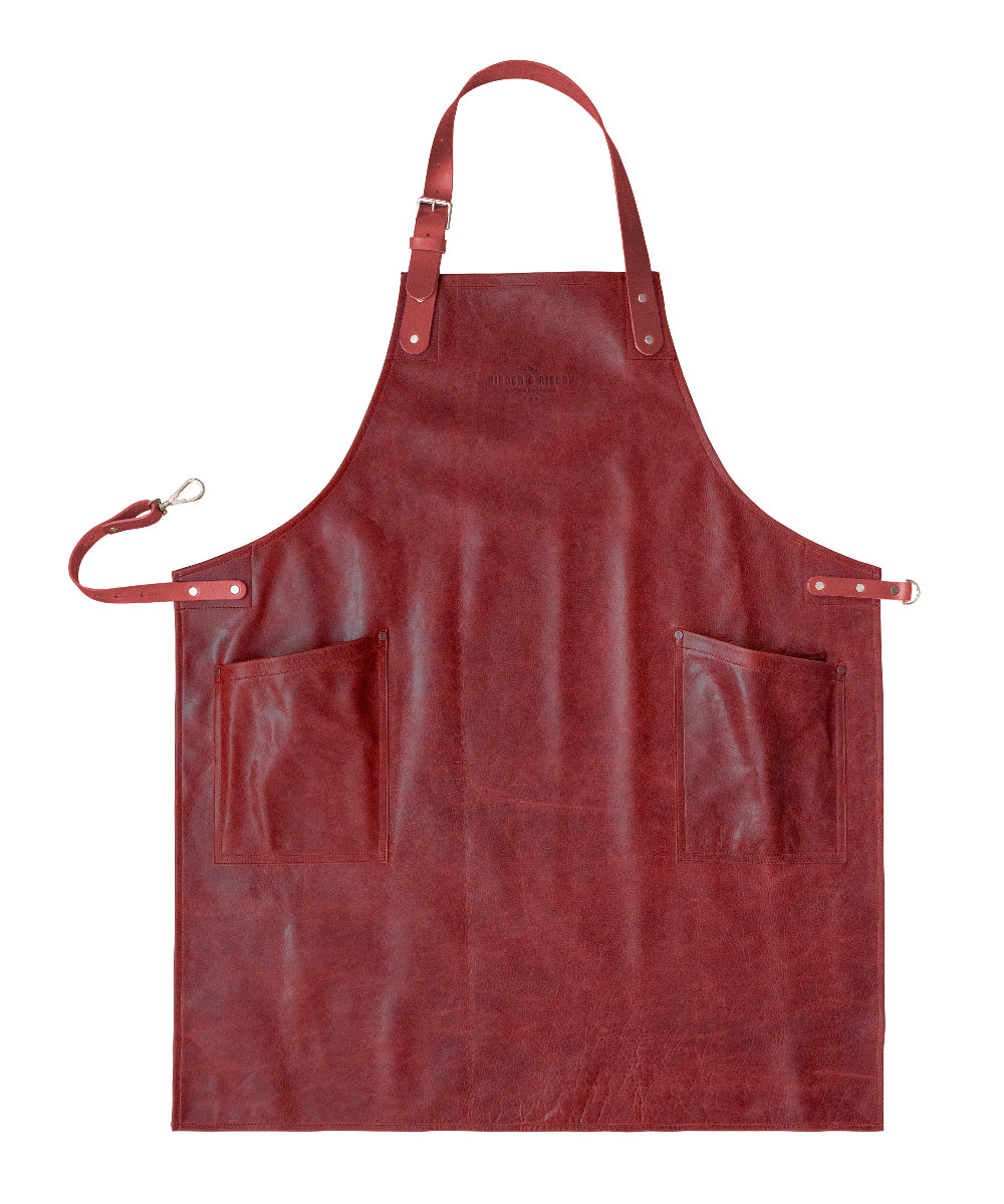 Red leather apron on a white background
