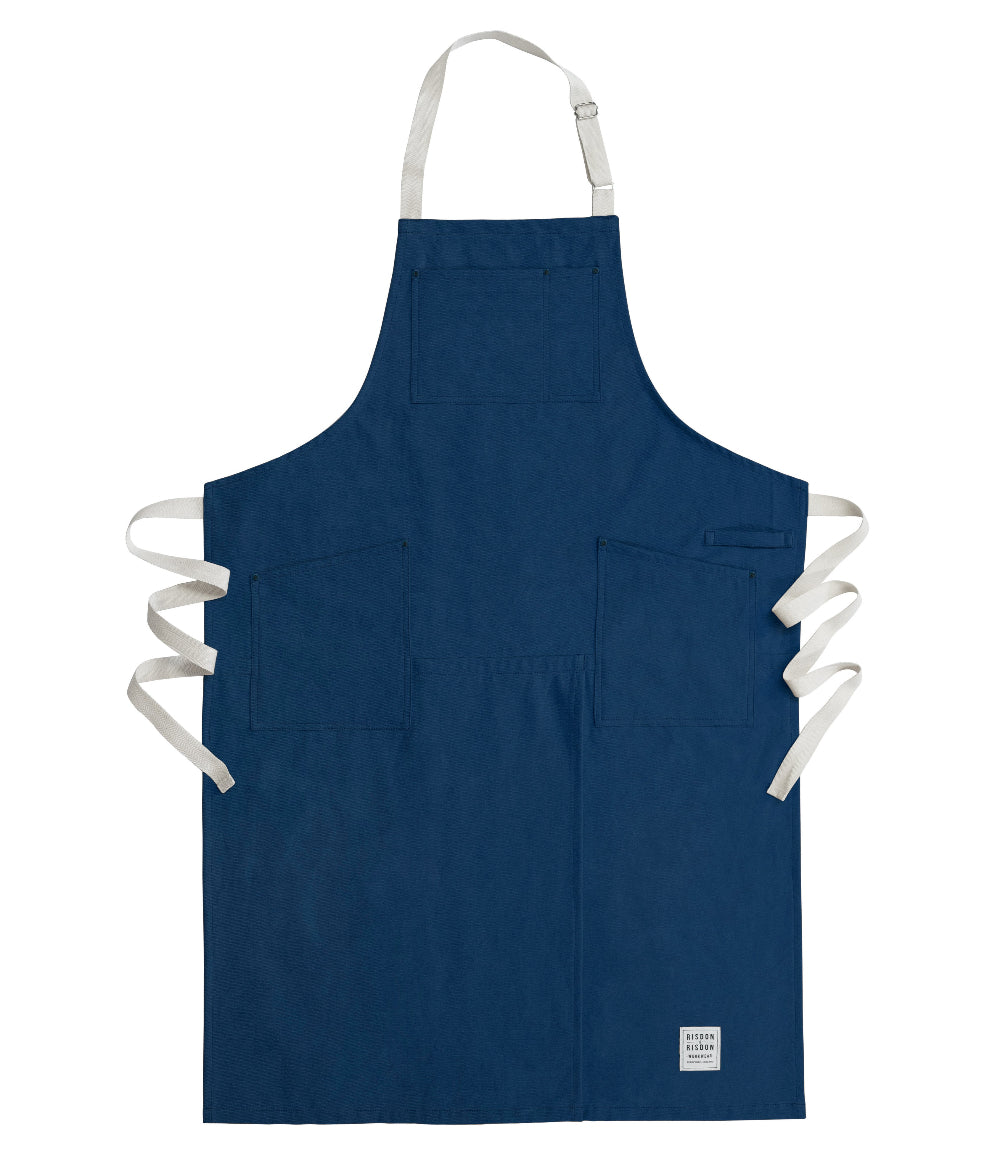 Blue apron with white straps on a white background