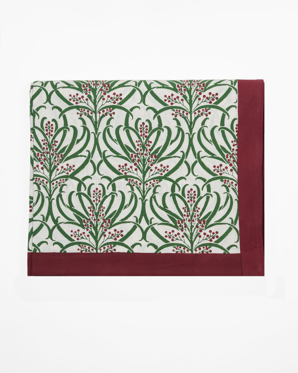 Rosie Dalia Winter Berries cotton Christmas tablecloth featuring hand block printed festive berries and foliage.