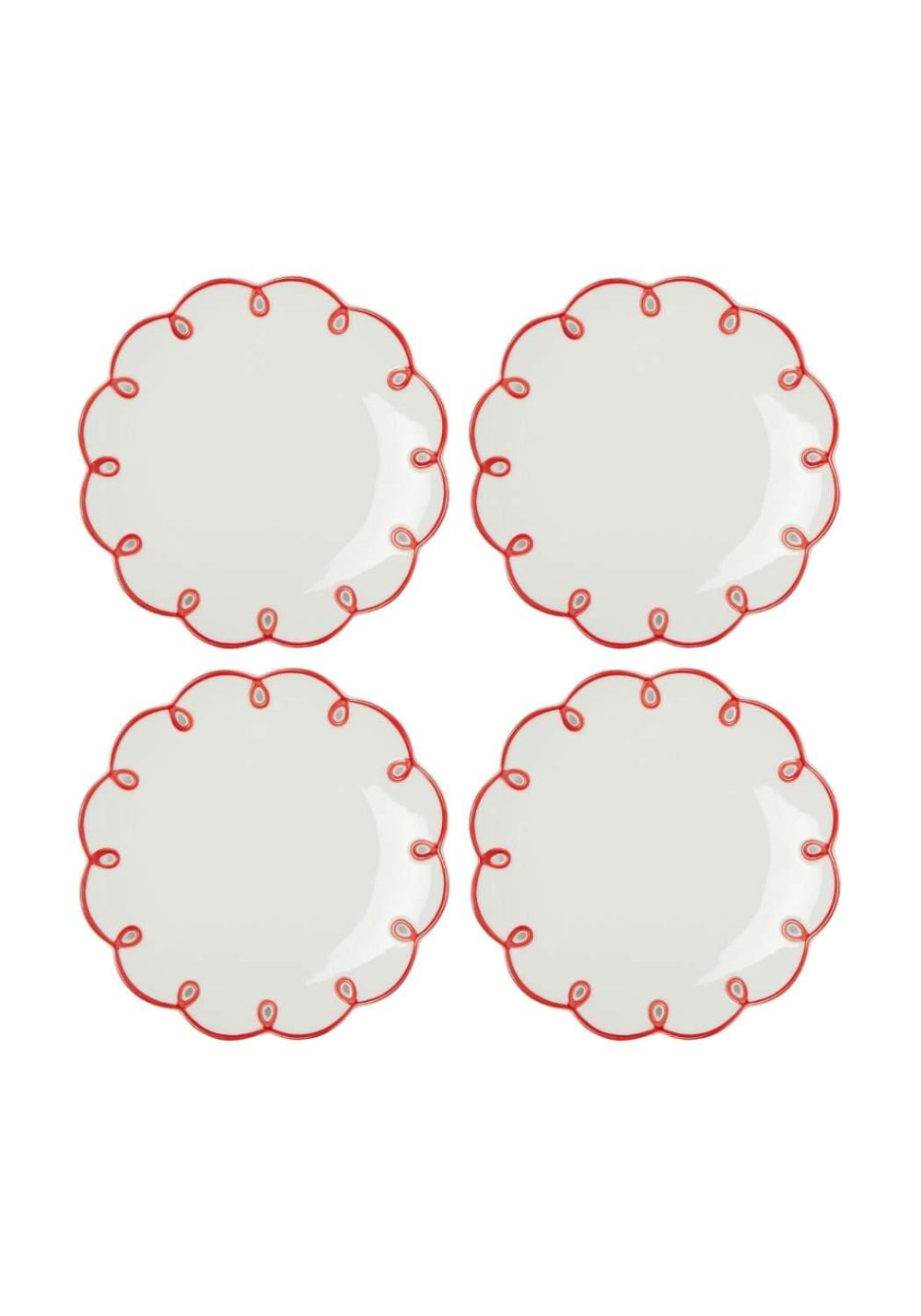 Four white plates with red decorative scalloped edges on a white background