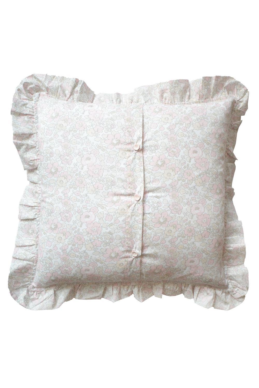 Decorative cushion back with ruffled edges on a white background