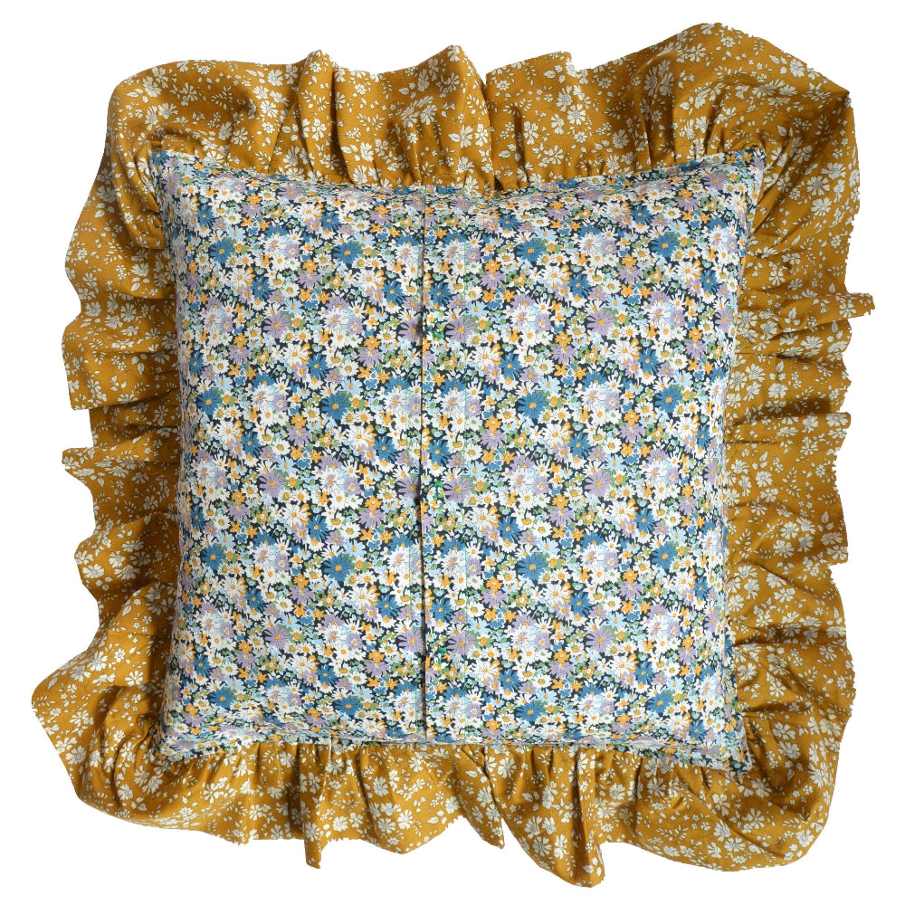 Back of Floral pillow with ruffled edges on a white background