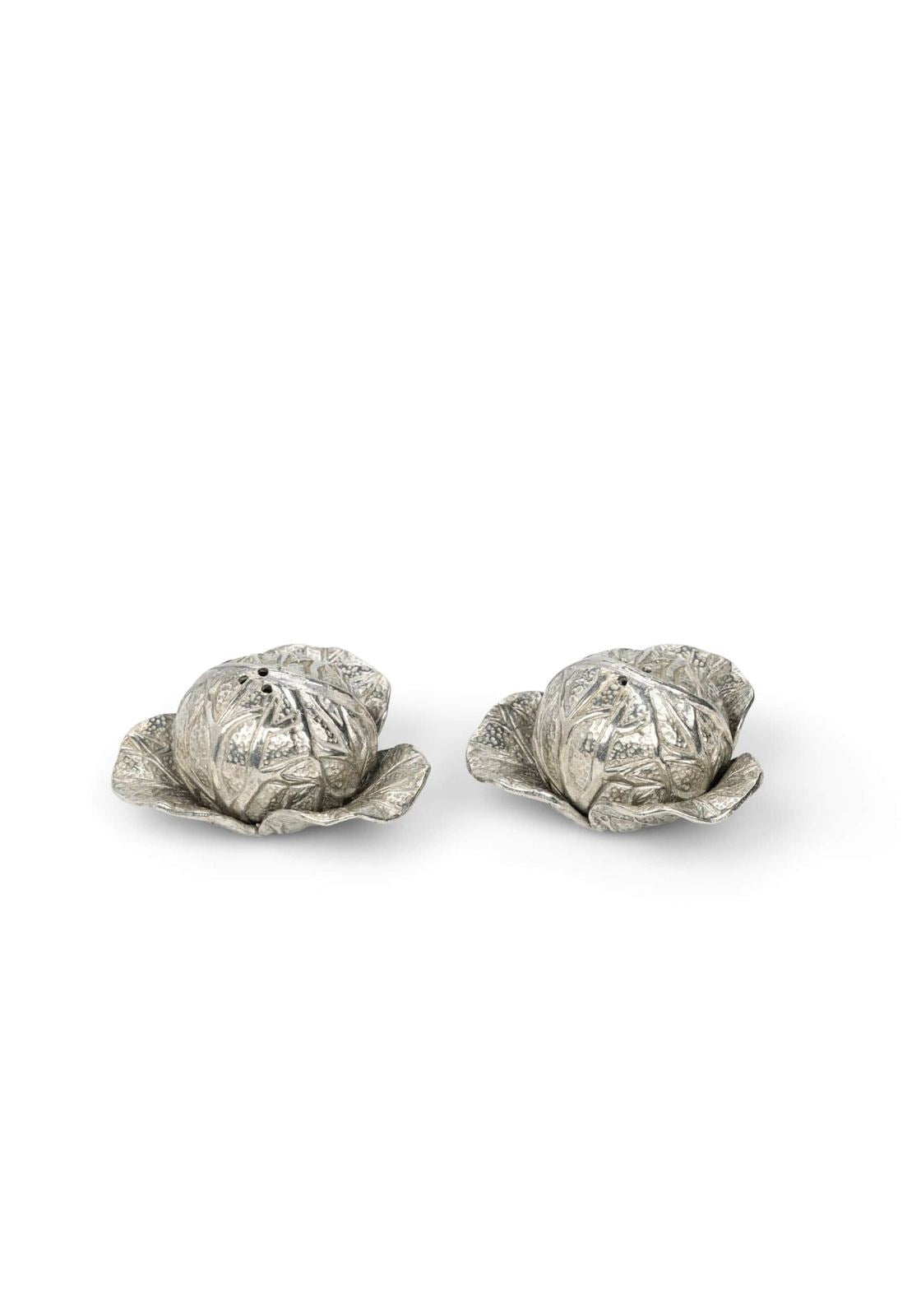Two silver pewter cabbage-shaped salt and pepper shakers on a white background