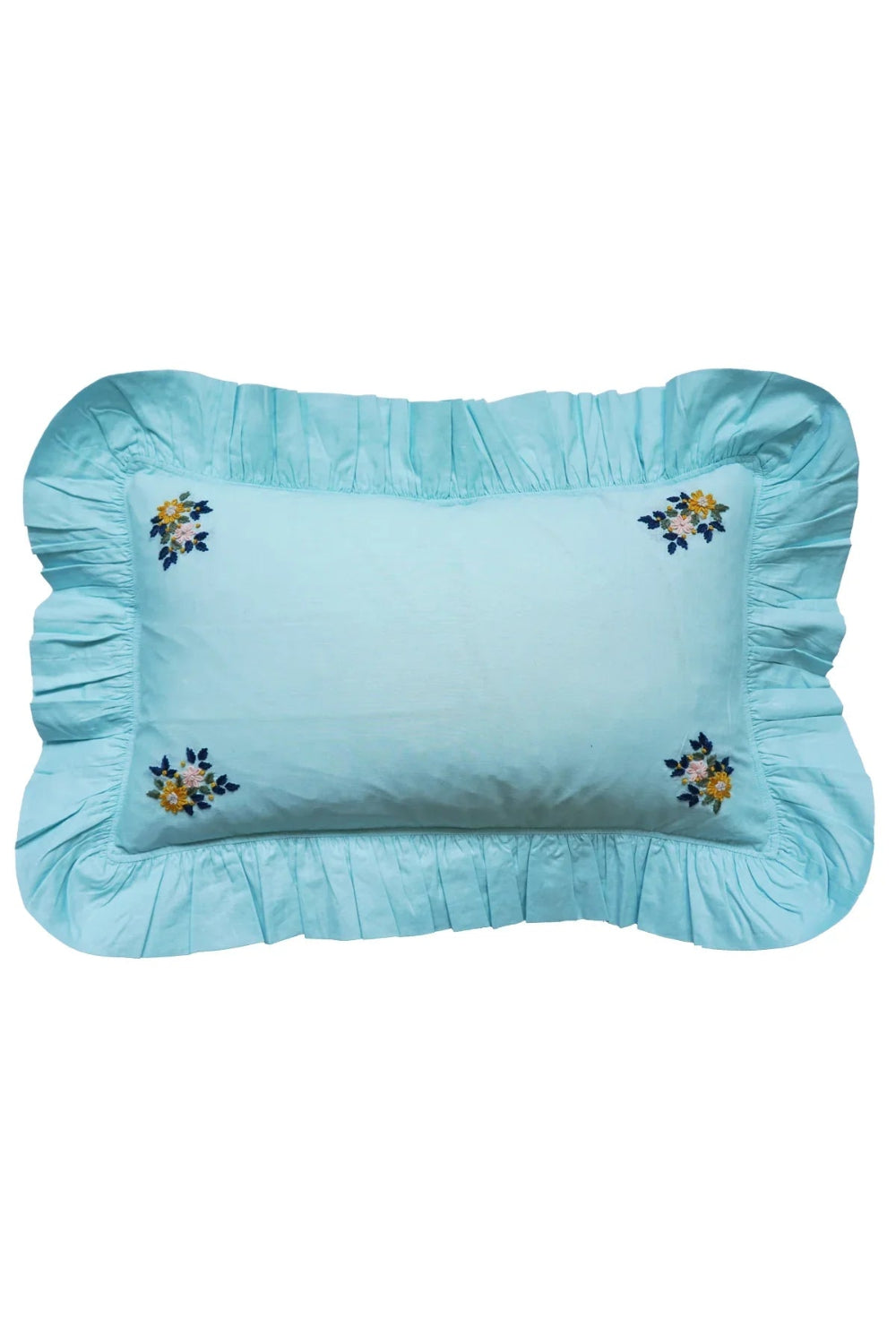 Light blue pillow with floral embroidery on a white background