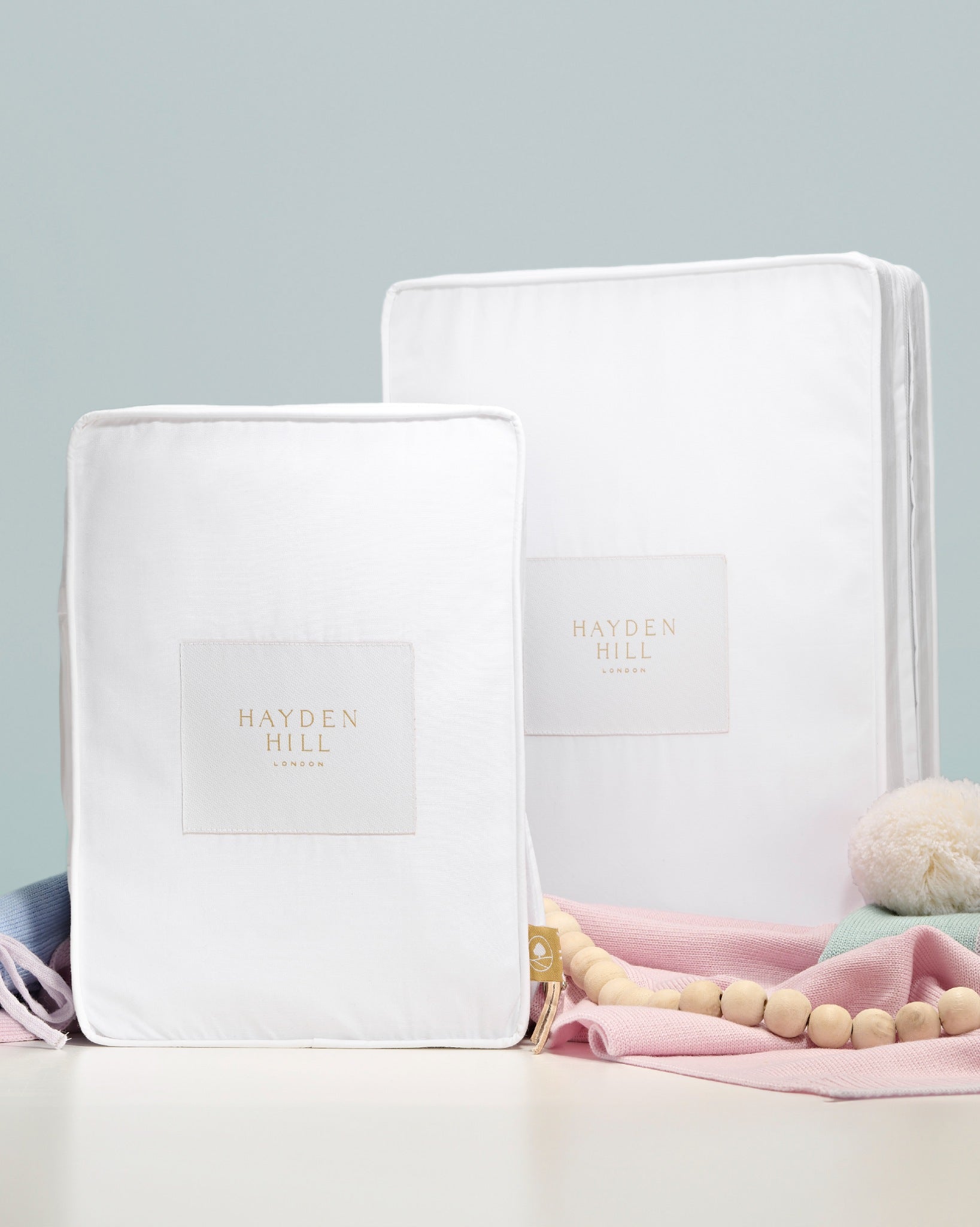 Two white boxes with 'Hayden Hill' branding on a light gray background.
