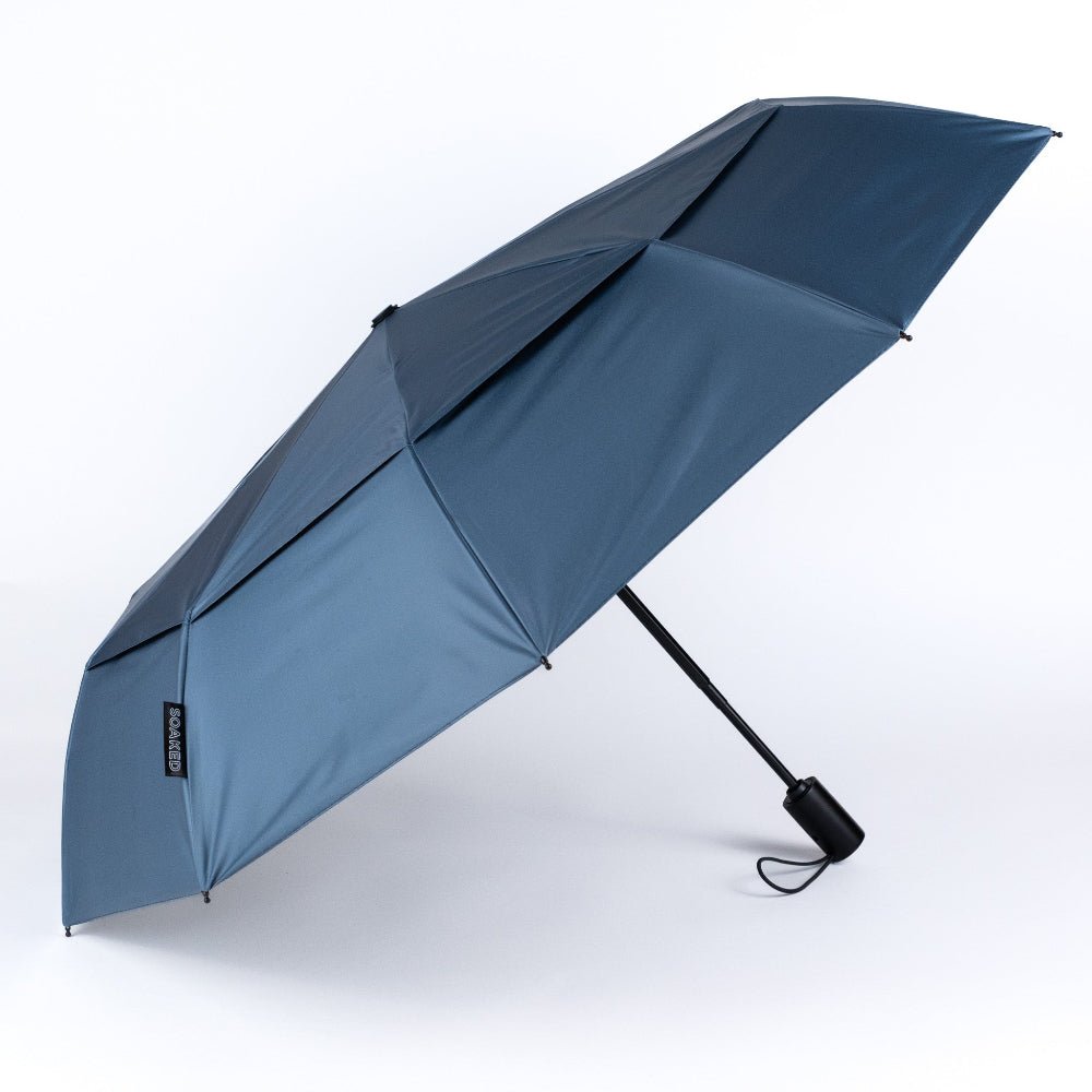 Blue umbrella on a white background