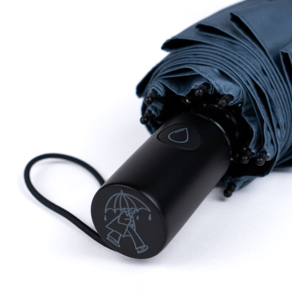 Blue umbrella with black handle on a white background