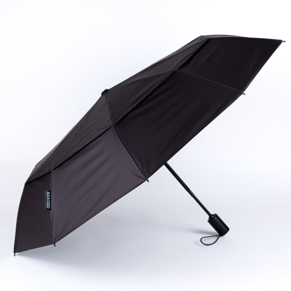 Black umbrella on a white background