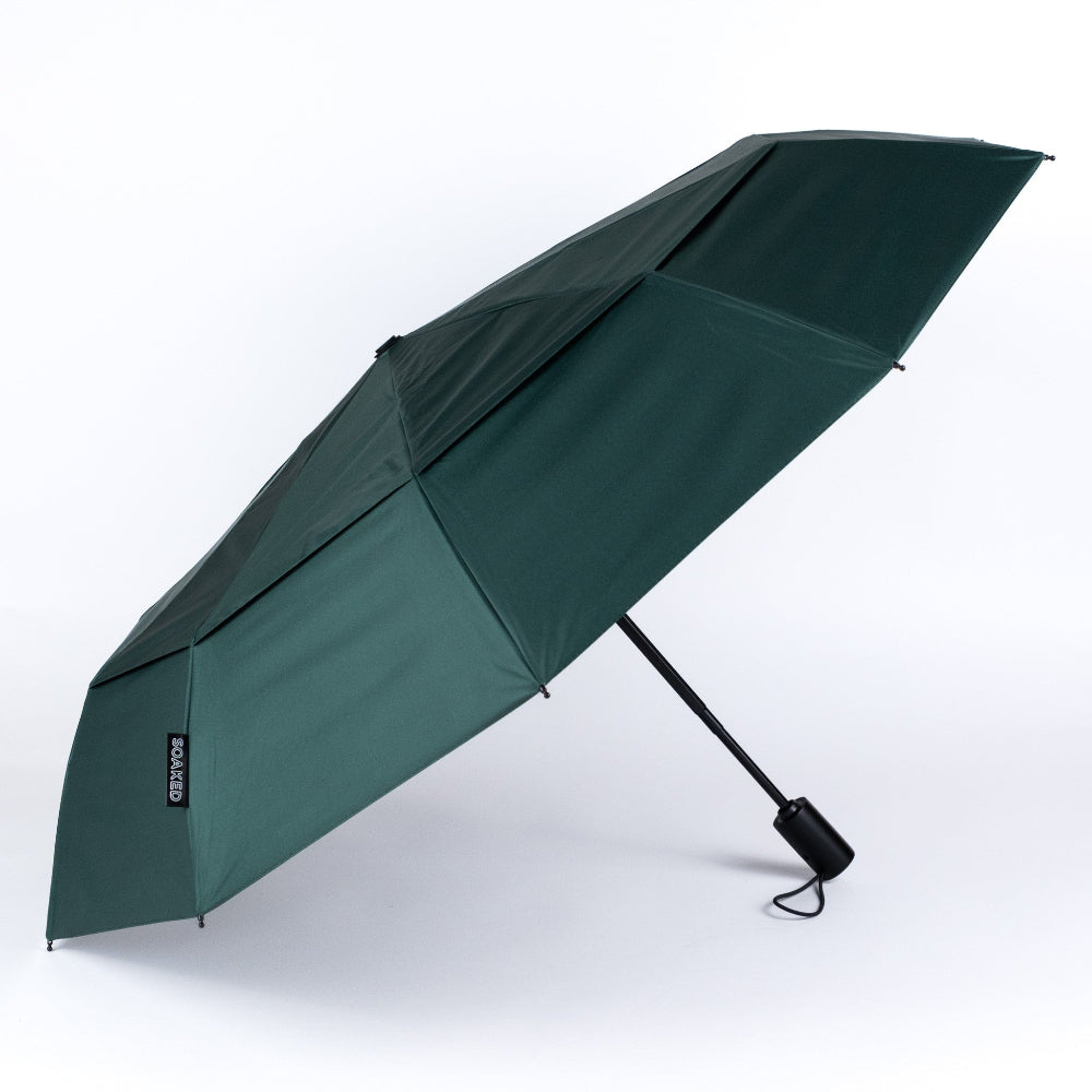 Green umbrella on a white background
