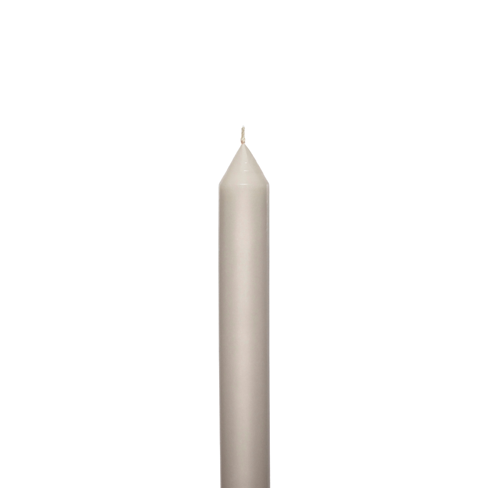 Soft grey metre candle on a white background