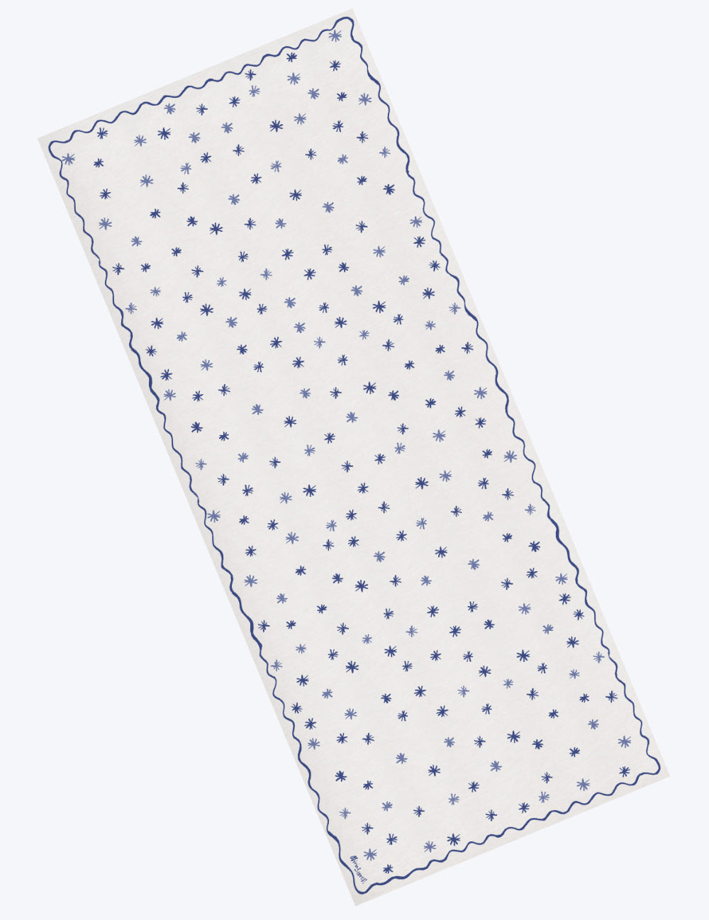 Linen tablecloth with blue star pattern on a white background