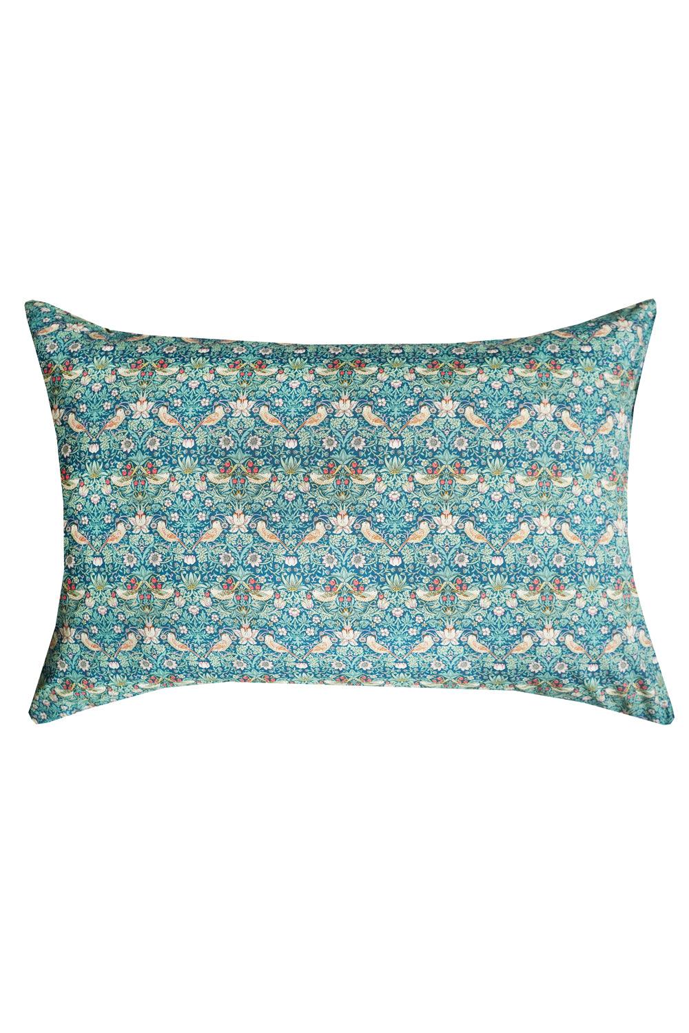 Decorative pillow with floral pattern on a white background