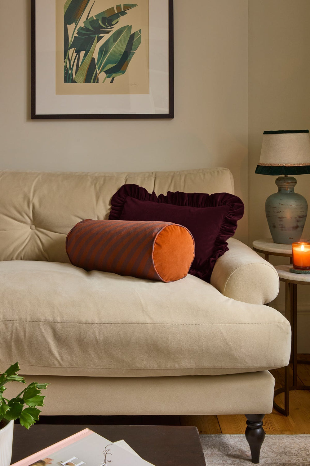 Striped cotton linen bolster cushion in chocolate and rust with piping