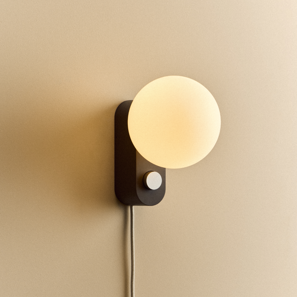 Tala Alumina Multi-Use Lamp mounted as a Charcoal wall light on