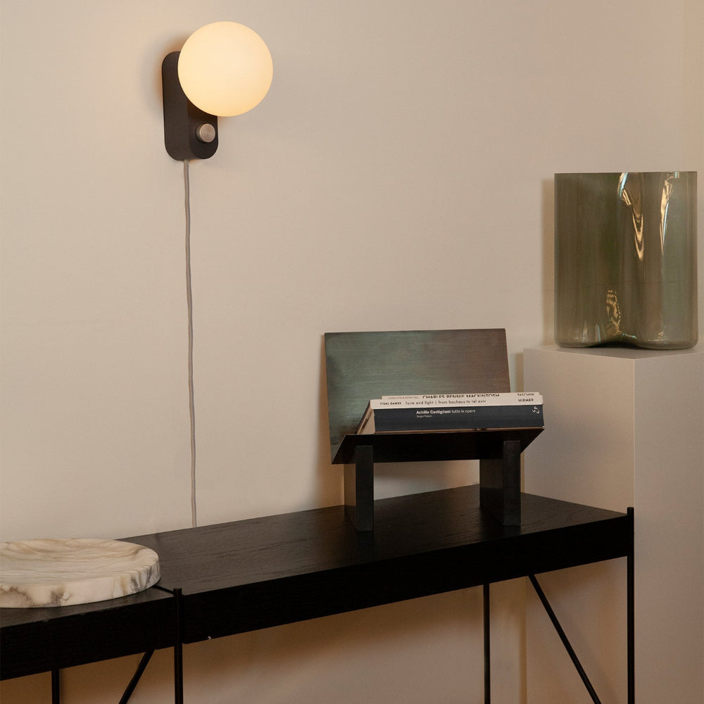 Tala Alumina Multi-Use Lamp mounted as a Charcoal wall light