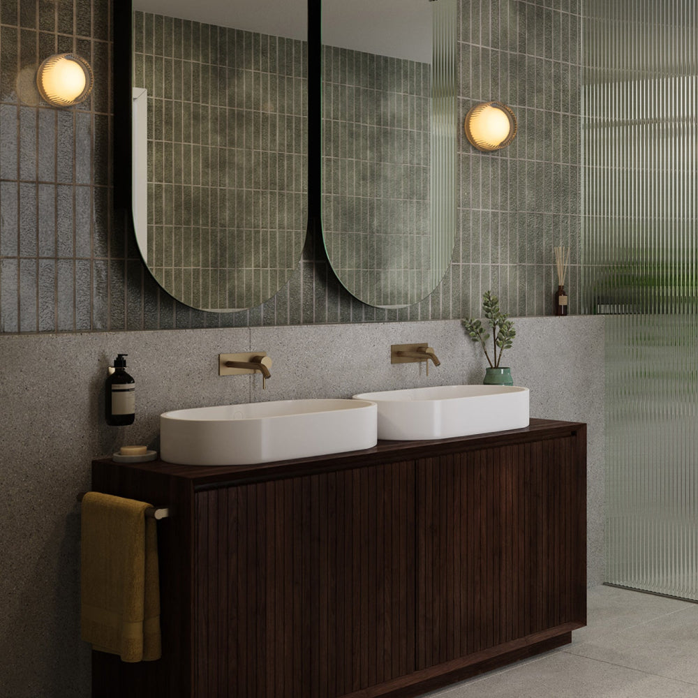 Tala Firth modern glass wall light installed on a wall