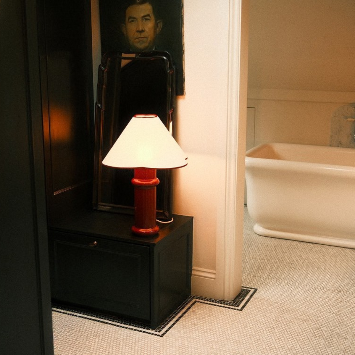 Tala Heath Table Lamp casting a warm diffused light