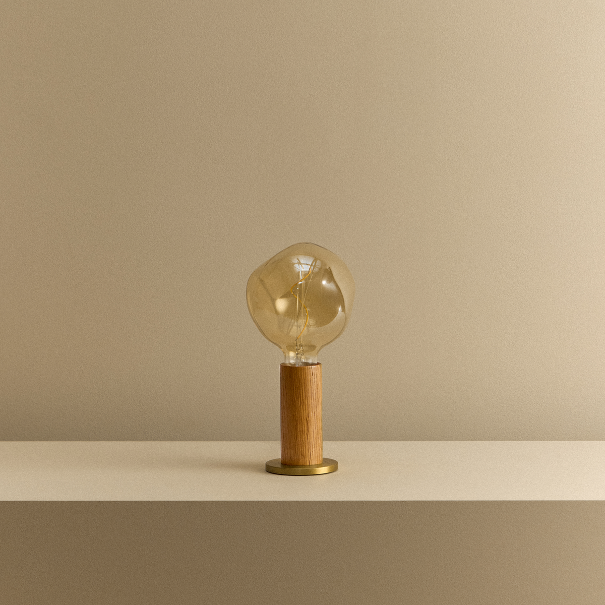 Tala Knuckle Table Lamp creating warm ambient light