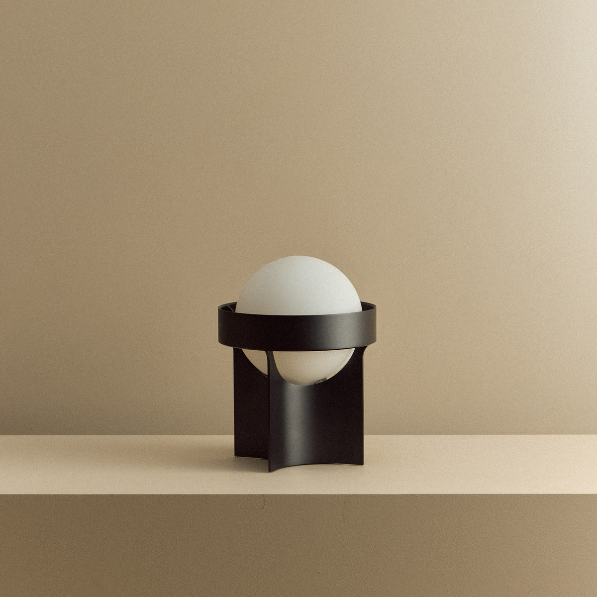 Close-up of the Tala Loop Table Lamp in Dark Grey