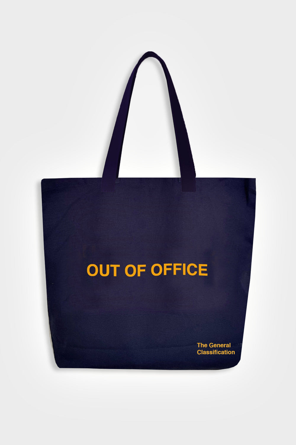 Navy tote bag with 'OUT OF OFFICE' text on a white background