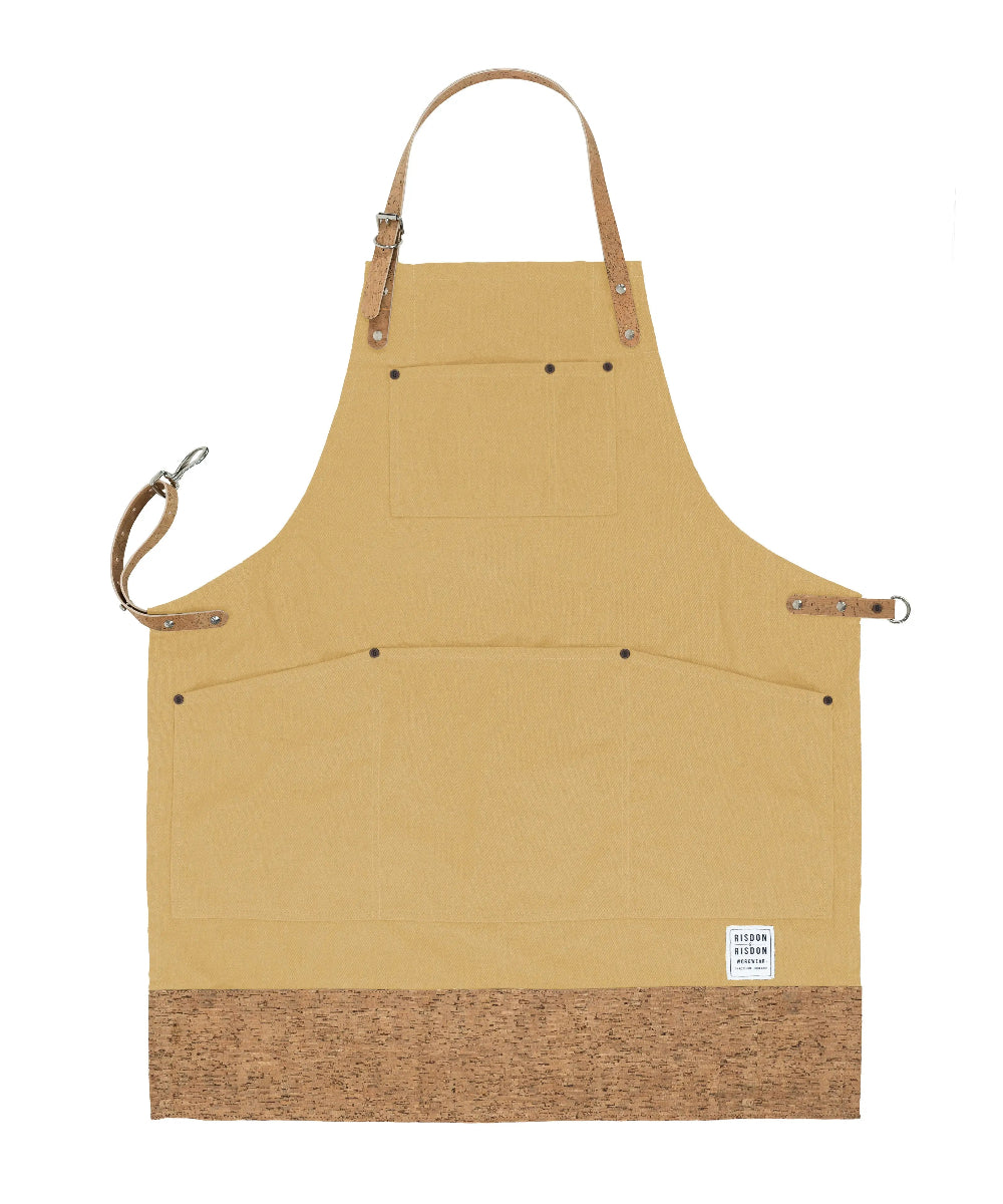 Beige apron with cork trim on a white background