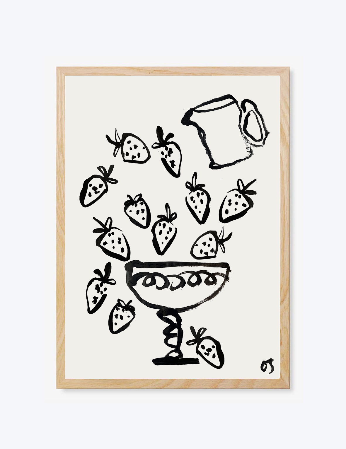 Framed artwork with black line drawing of a martini glass and strawberries on a white background