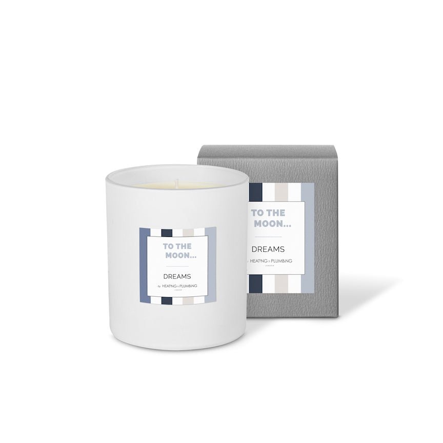 White candle with a label and grey box on a white background