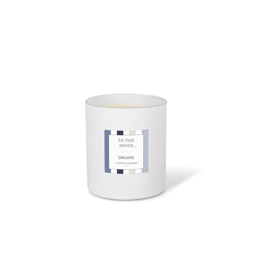 White candle with a label on a white background