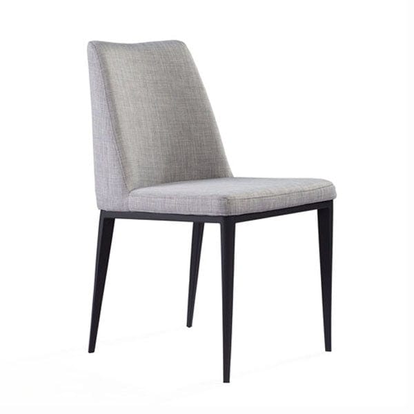 Tommy Franks Grey upholstered dining chair with black legs on a white background