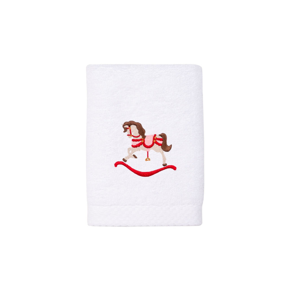 White towel with a embroidered rocking horse design on a white background christmas bathroom ideas
