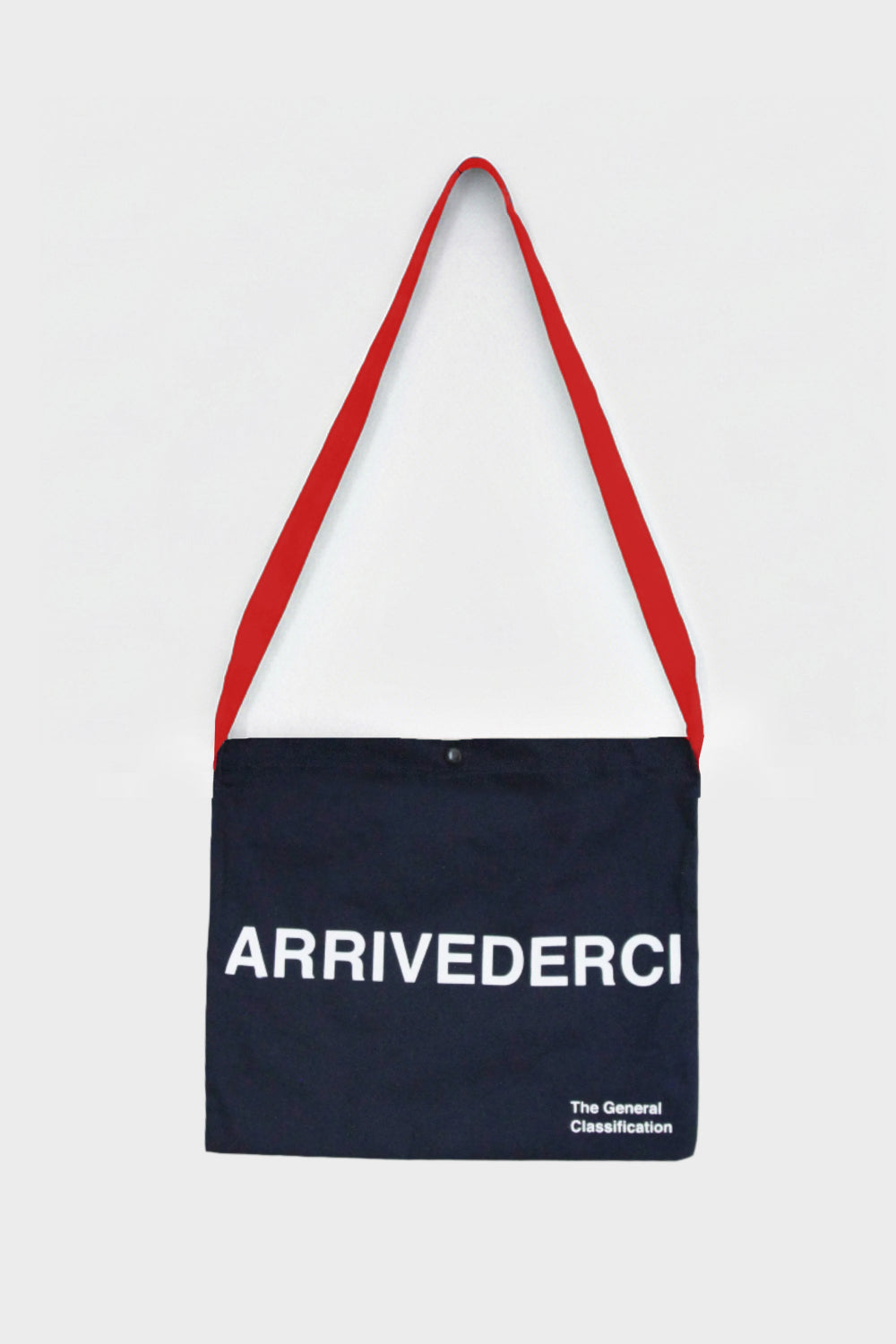 Navy tote bag with red strap and 'ARRIVEDERCI' text on a light grey background