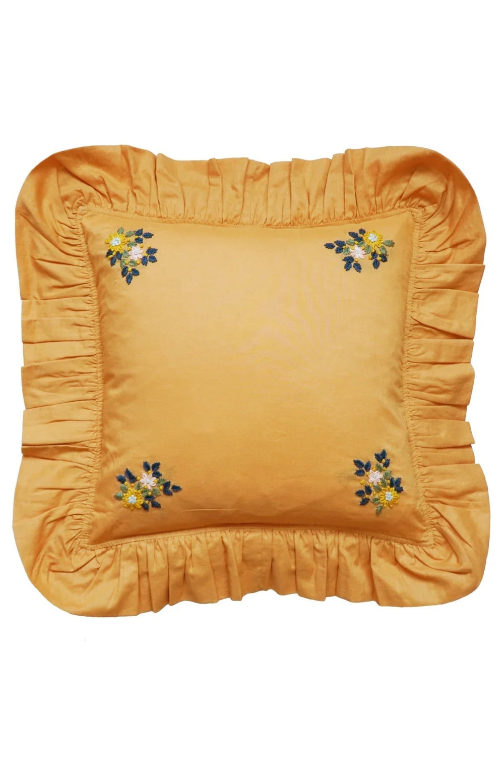 Tumeric cushion pillow with floral embroidery and ruffled edges on a white background