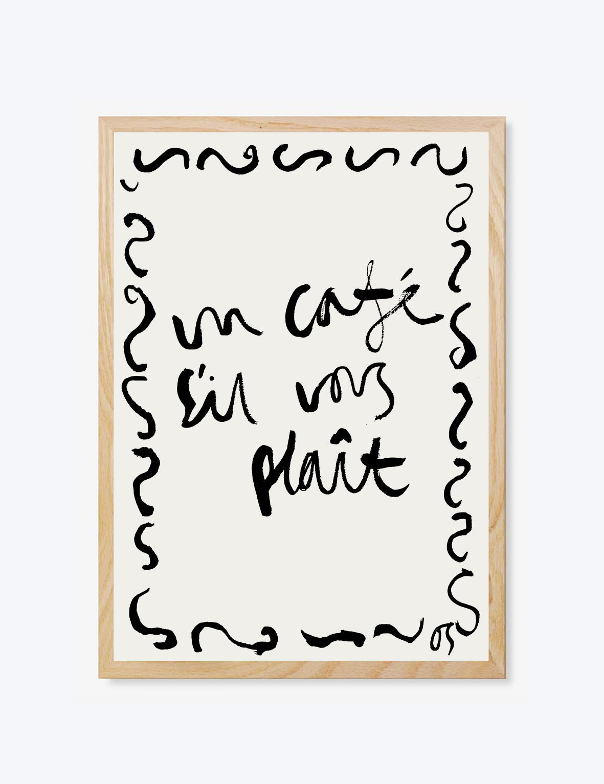 Framed artwork with black text 'un cafe sil vous plait' on a white background