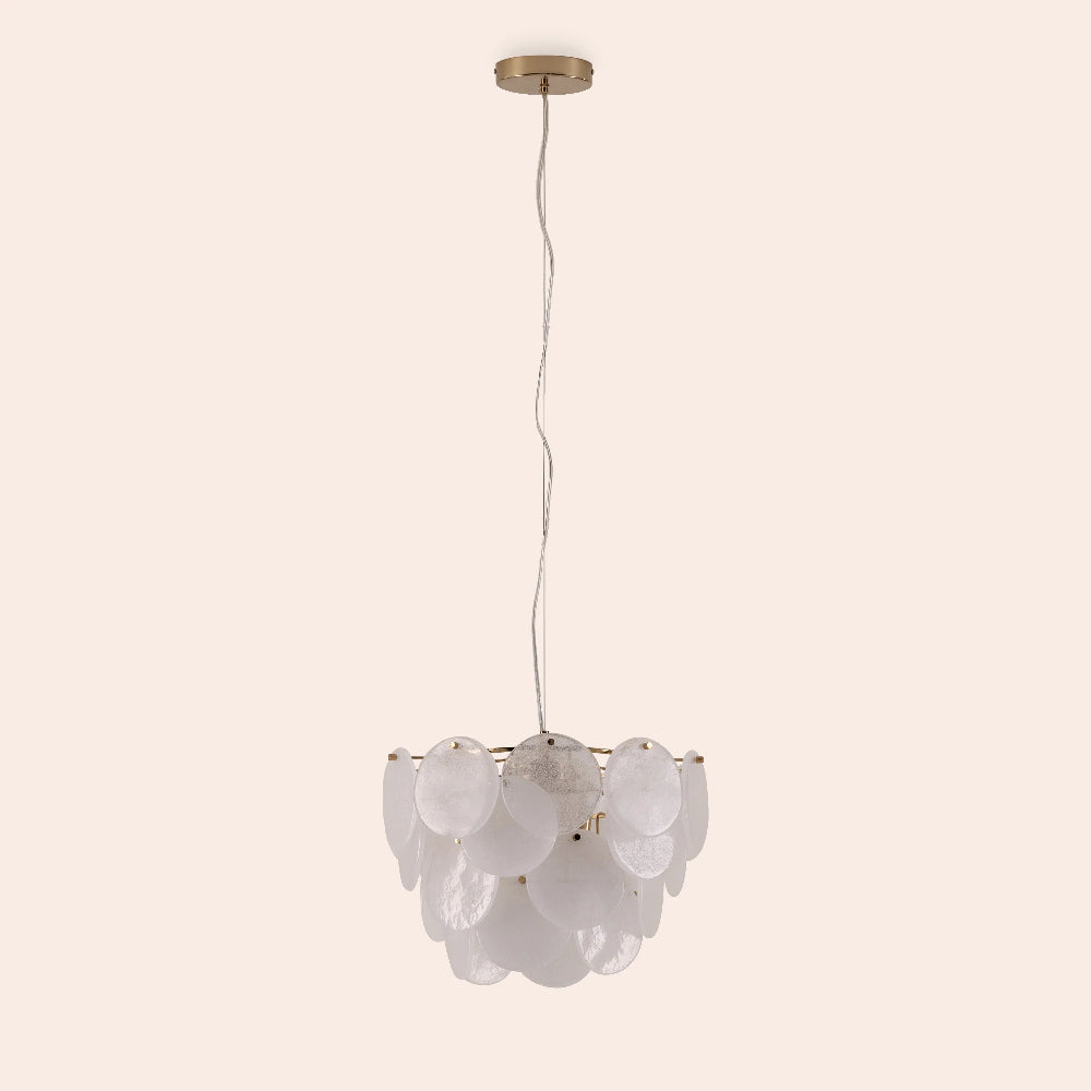Modern pendant light with white glass shades on a beige background
